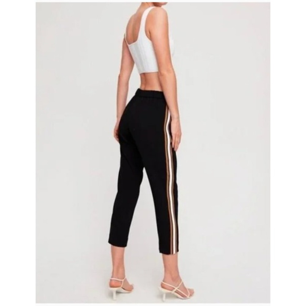 Babaton Black Cropped Track Pants with Gold & Cream Side Stripes